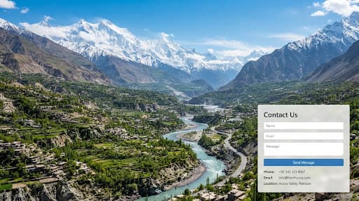 Snow-capped peaks rising through cloud above the Hunza valley